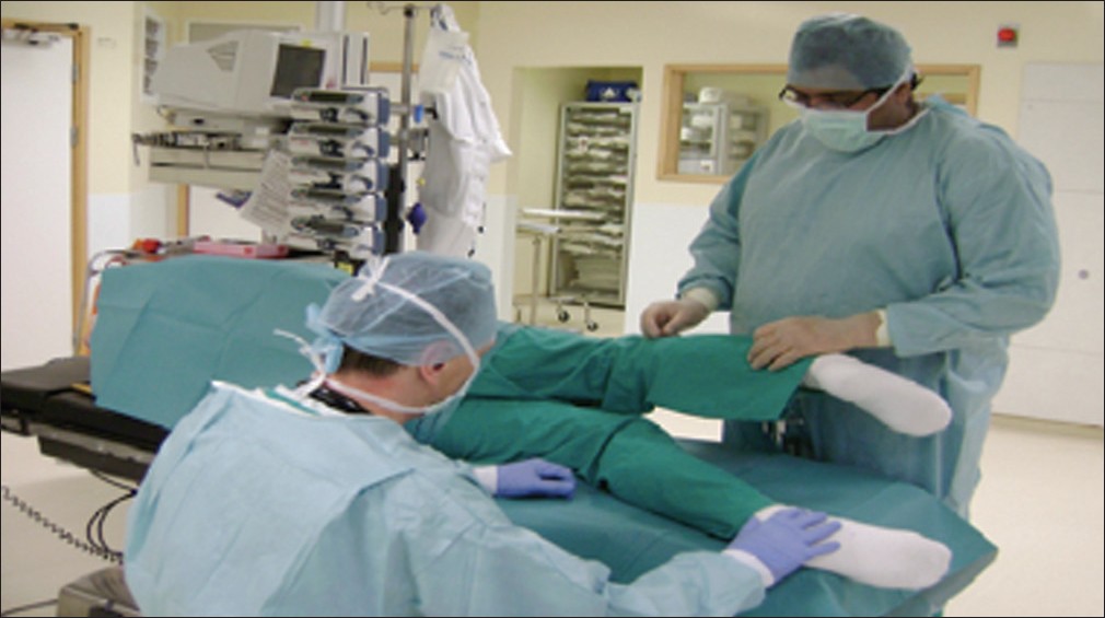 Figure 2: Patient positioning allowing two members of the surgical team to operate simultaneously