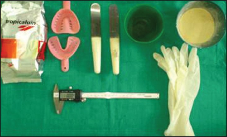 Figure 4: Alginate impression material, mixing bowl and spatula, impression trays, dental stone, hand gloves and digital Vernier caliper